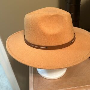 Stylish hat new without tags. Ready to step out and rock this hat